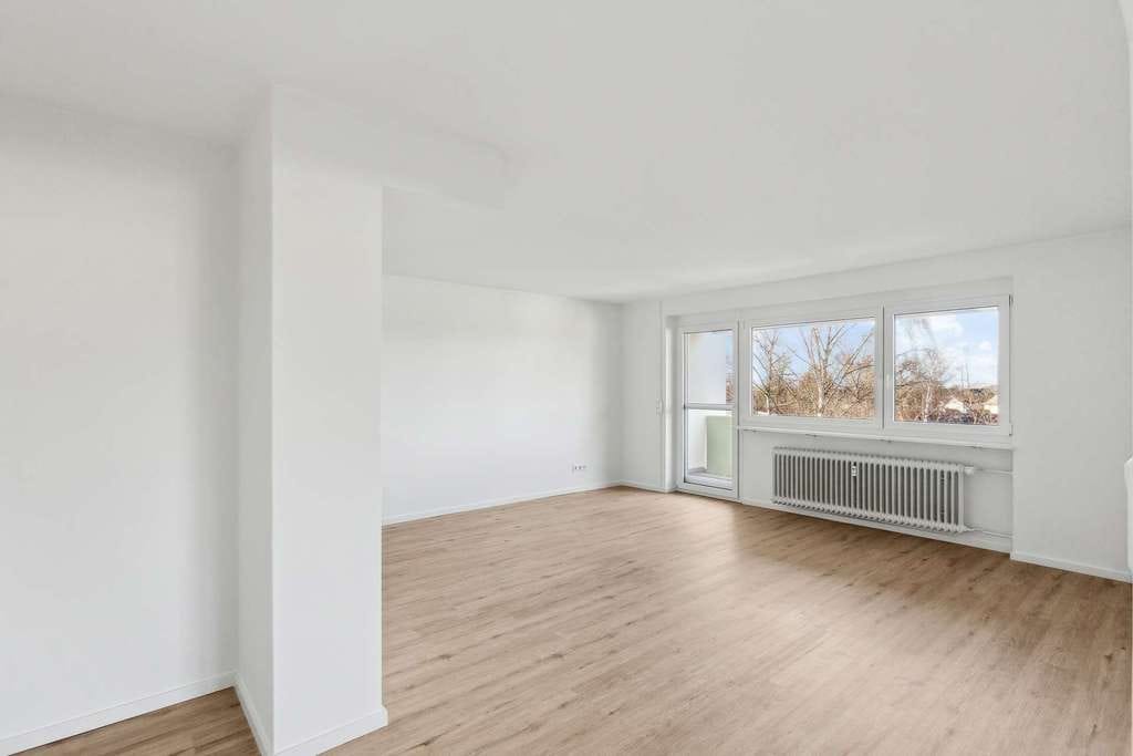 Immobilie in Staufen im Breisgau - Sanierte 4,5- Zimmer Wohnung in Staufen mit Blick zum Schloss und den Vogesen - Bild 1