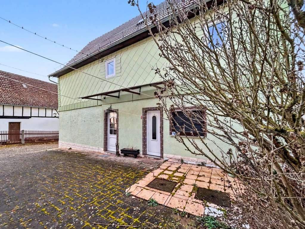 Immobilie in Lichtenau - Provisionsfrei für Käufer - Einfamilienhaus mit Nebengelass und Potential in Ottendorf - Bild 2