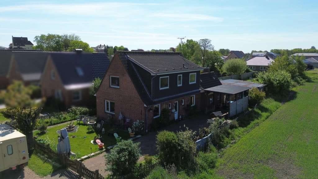 Immobilie in Groven - Wohnen in Eidernähe! Massiv gebautes EFH mit Blick  auf die Dithmarscher Marschlandschaft - Bild 1