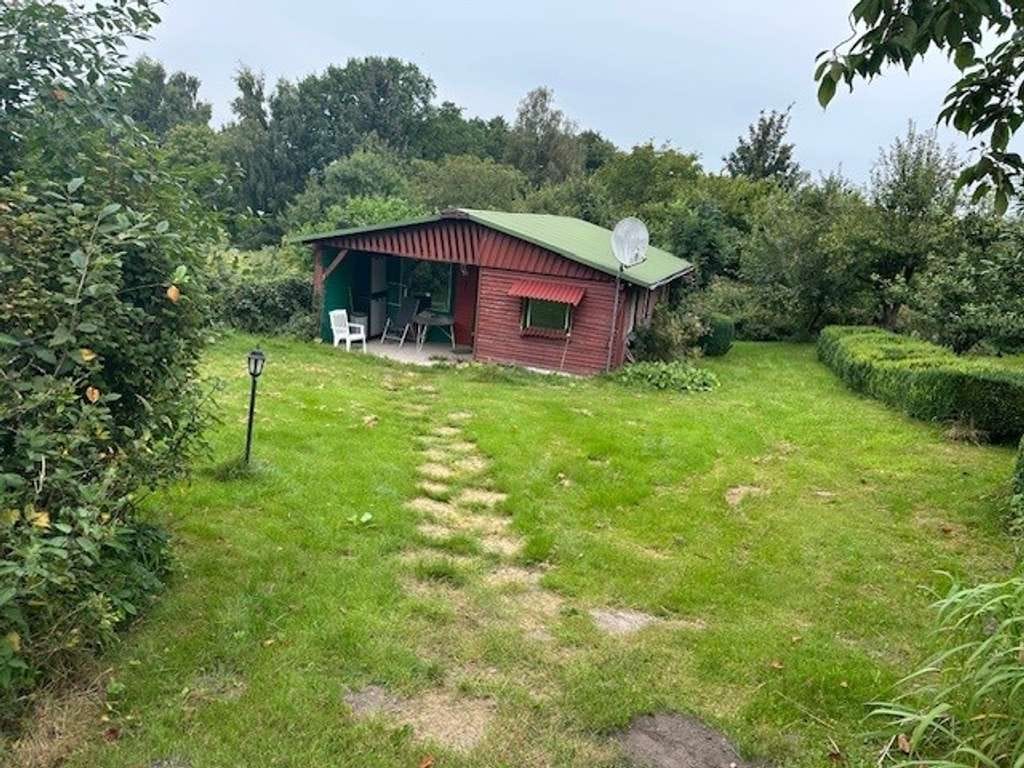 Immobilie in Westensee - Renovierungsbedürftiges Einfamilienhaus in Westensee – großes Traumgrundstück mit viel Potenzial - Bild 3