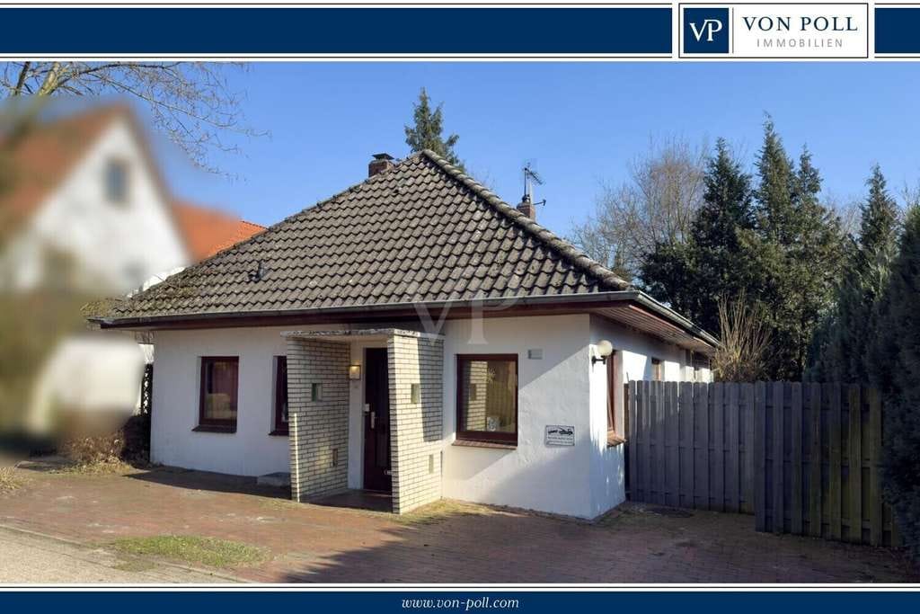 Immobilie in Wardenburg - Großzügiger Bungalow mit zwei Wohneinheiten direkt am See - Bild 0