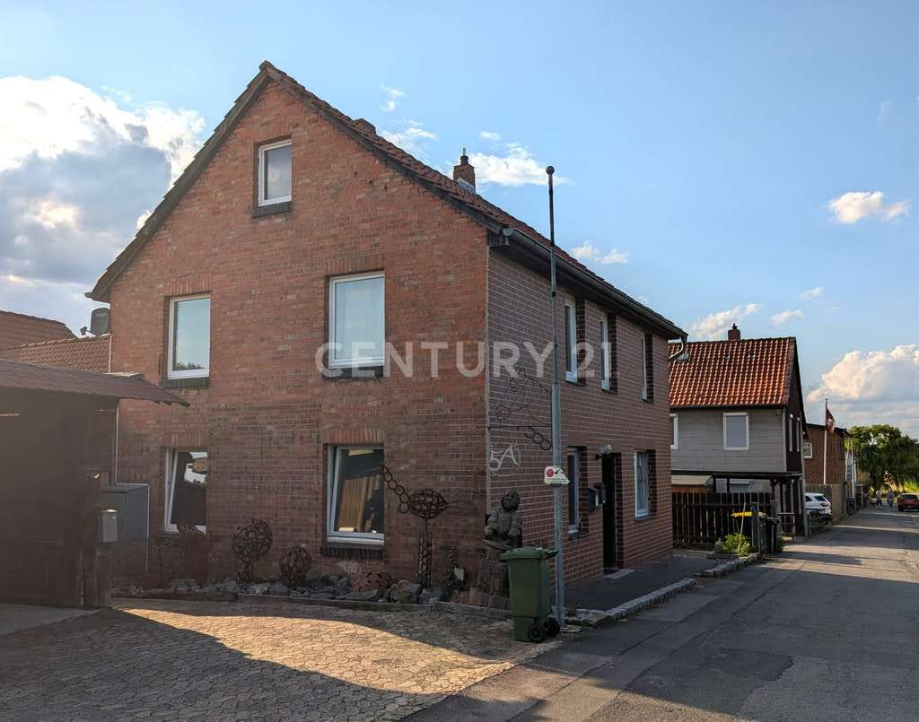 Immobilie in Algermissen - Charmantes Investment-Duo: Massives Zweifamilienhaus & Holzbohlenhaus EEK A+ - Bild 3