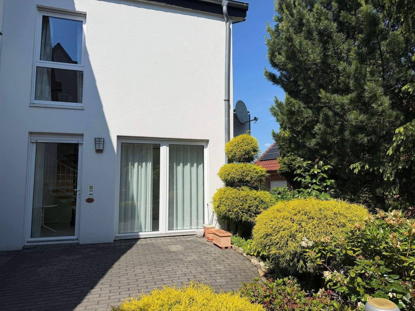 Immobilie in Hasbergen - Großzügiges Wohnhaus mit separater Wohneinheit, zwei Garagen und großem Grundstück in ruhiger Sackgassenlage - Bild 3