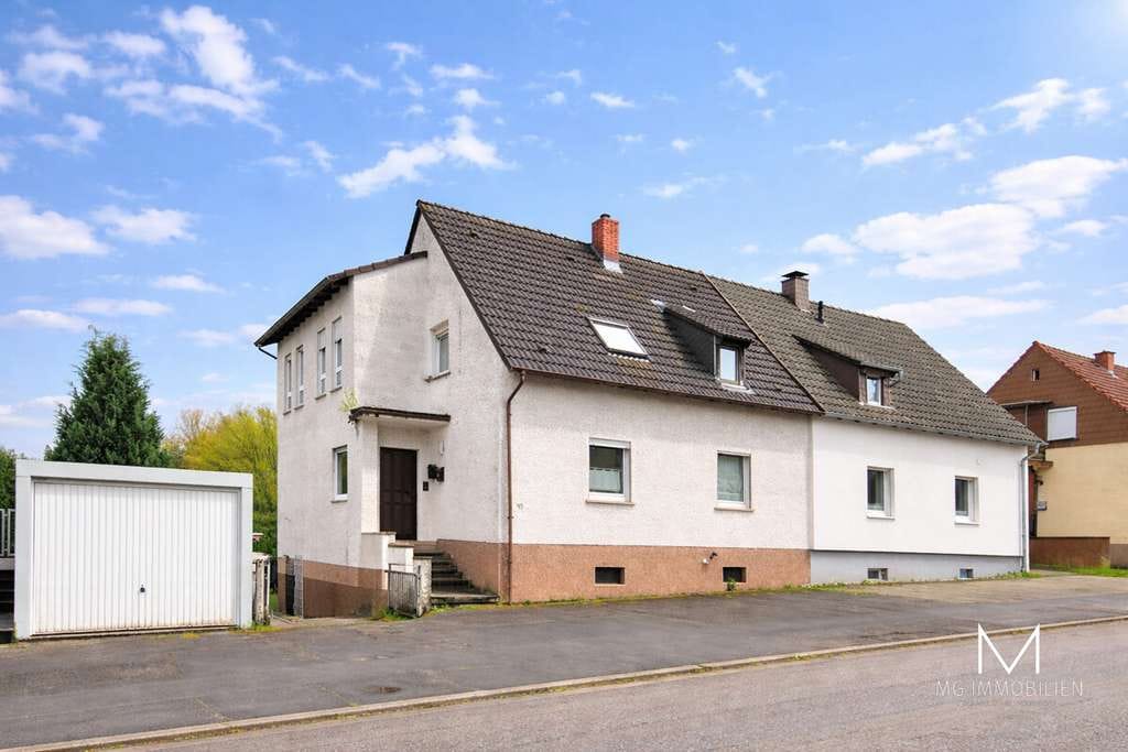 Immobilie in Waldmohr - MG - Waldmohr: Charmantes Einfamilienhaus mit Garten und Garage - Bild 0