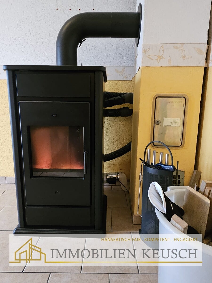 Immobilie in Twistringen - Energieeffiziente DHH mit PV, neuer Wärmepumpe und wasserführendem Kamin in Bestlage - Bild 3