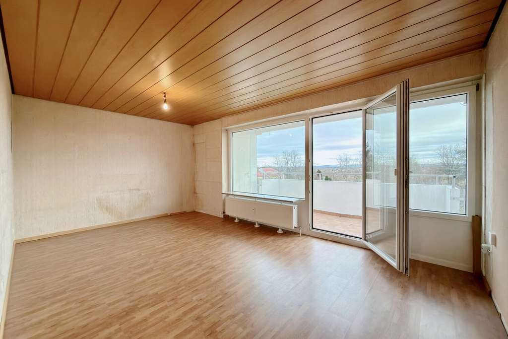 Immobilie in Aichwald - 3-Zimmer-Dachgeschosswohnung mit Balkon und Alb-Blick in ruhiger Lage - Bild 1