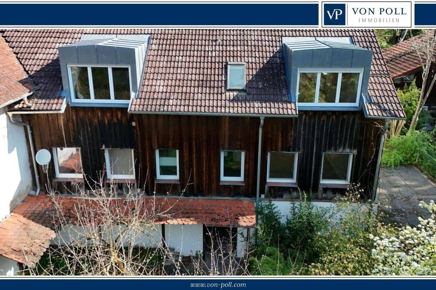 Immobilie in Neufahrn bei Freising - Aufgeteiltes Mehrfamilienhaus in ruhiger Lage mit Entwicklungspotenzial - Bild 0