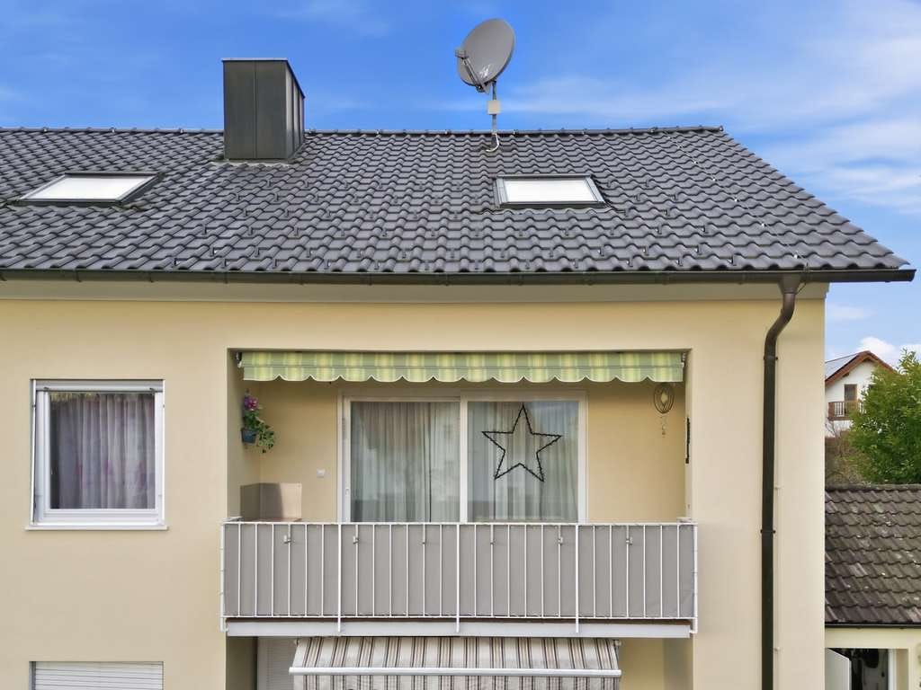 Immobilie in Lindau (Bodensee) - Kapitalanlage: 3-Zimmer-Wohnung mit Balkon, Bergblick und großer Doppelgarage - Bild 0
