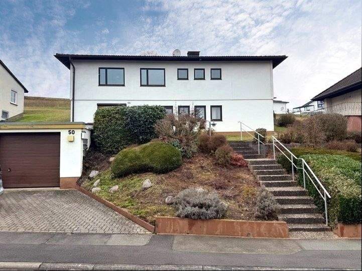 Immobilie in Ludwigsau - Wohnhaus mit Doppelgarage im sonnigen Friedlos - Bild 0