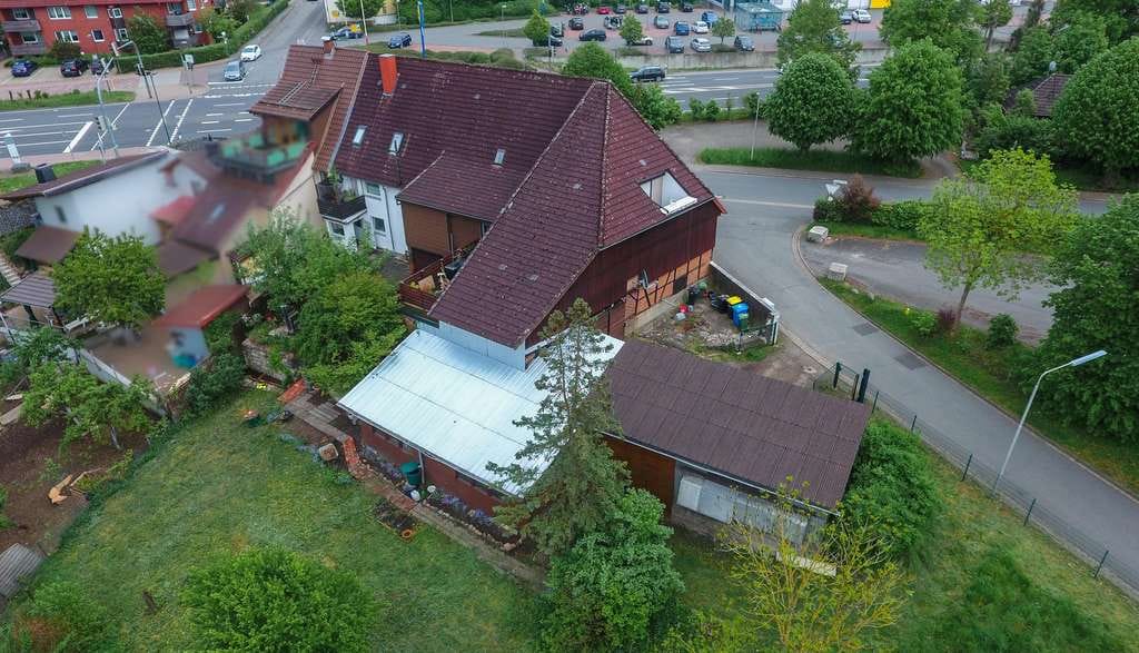 Immobilie in Herzberg am Harz - Voll vermietetes Mehrfamilienhaus mit Garagen, Scheune, viel Nutzfläche & zusätzlichem Baugrundst� - Bild 1