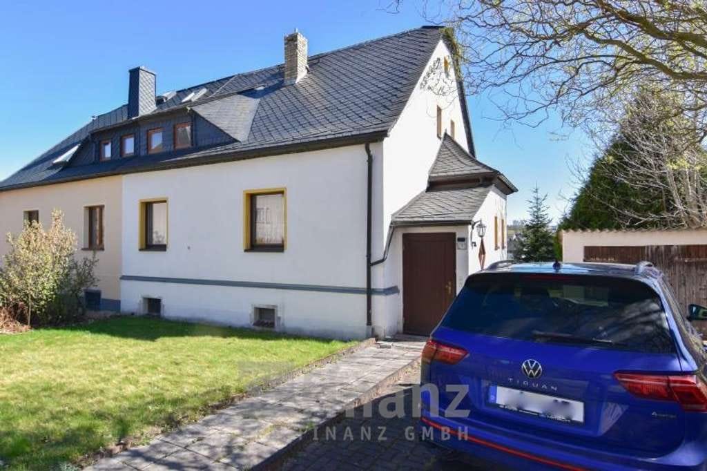 Immobilie in Oelsnitz/Erzgeb. - Doppelhaushälfte in Oelsnitz/Erzgeb. kaufen: 124 m² Wohnfläche, schöner Garten, Garage und Keller - Bild 0