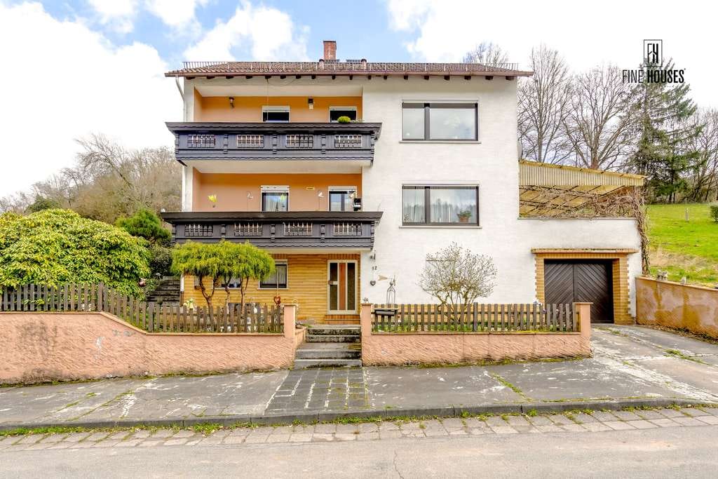 Immobilie in Erbach - Großzügiges Zweifamilienhaus mit Entwicklungspotenzial in ruhiger Lage von Erbach-Ebersberg! - Bild 1