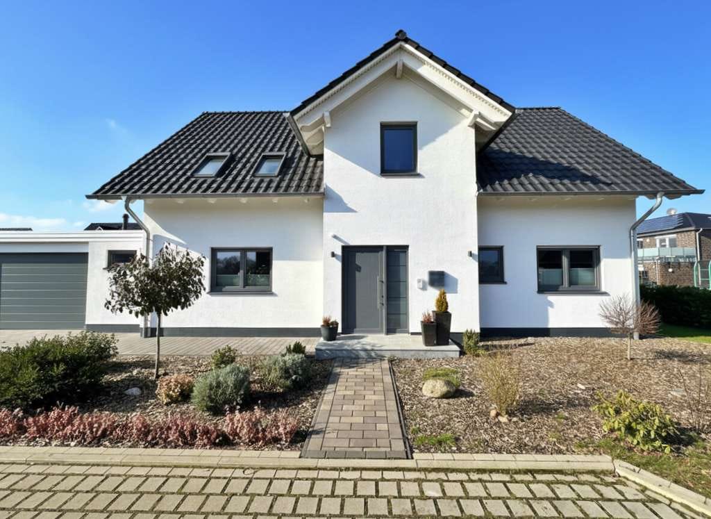 Immobilie in Dötlingen - Neuwertiges Ein-/ Zweifamilienhaus in energetischer Bauweise in Dötlingen Brettorf - Bild 3