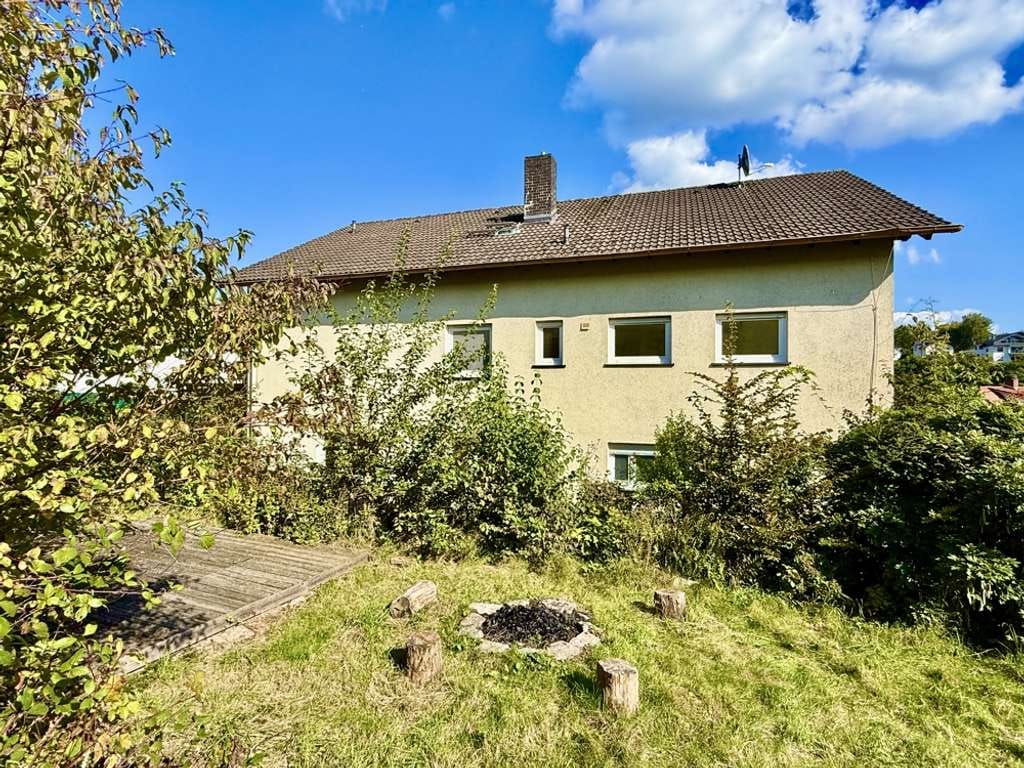 Immobilie in Mörlenbach - +++ Zweifamilienhaus mit Ausbaureserve in Feldrandlage +++ - Bild 0
