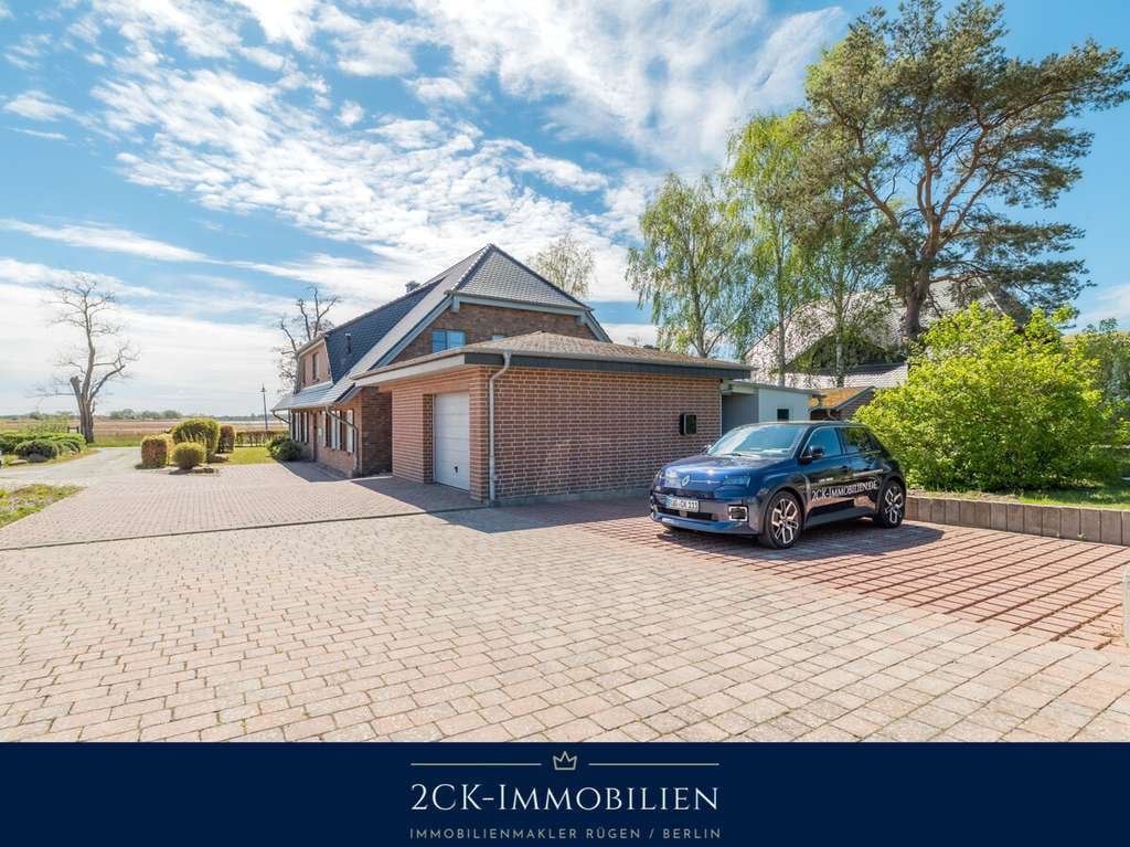 Immobilie in Mönchgut - Mönchgut: Zukunftssicheres Familien- und Ferienhaus mit autarker Technik & Boddenblick, PV, Erdwärme - Bild 2