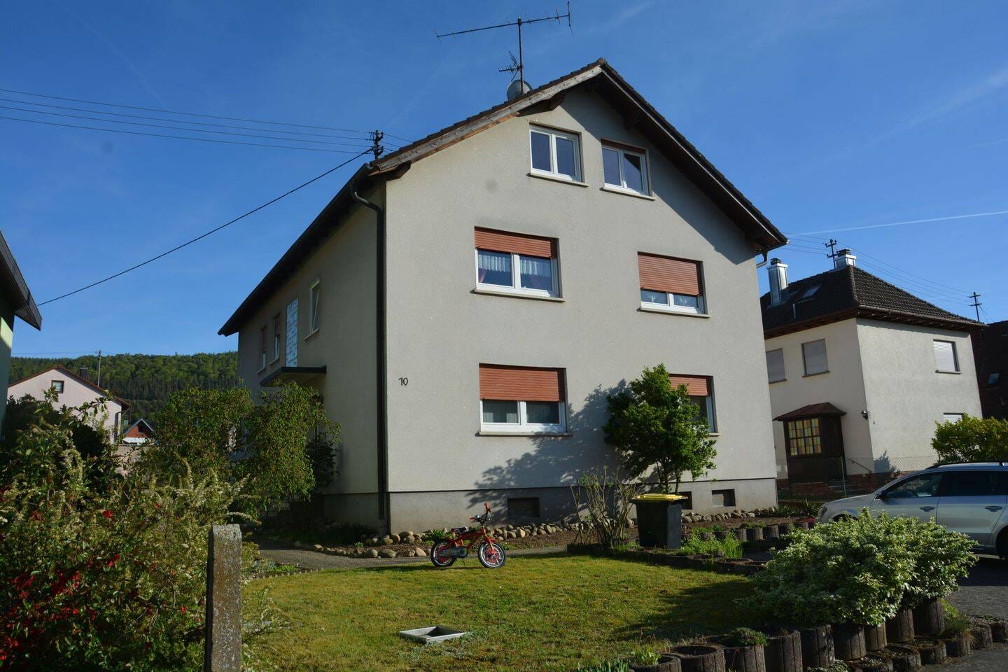 Immobilie in Wertheim - Geräumiges Mehrfamilienhaus mit Balkon und Garten in Mondfeld - Bild 0