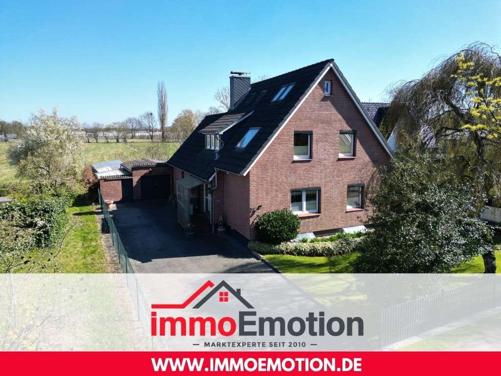 Immobilie in Tostedt - Natur vor der Tür, Stadt in Reichweite – Familienhaus auf großem Grundstück, teilweise  modernisiert - Bild 0