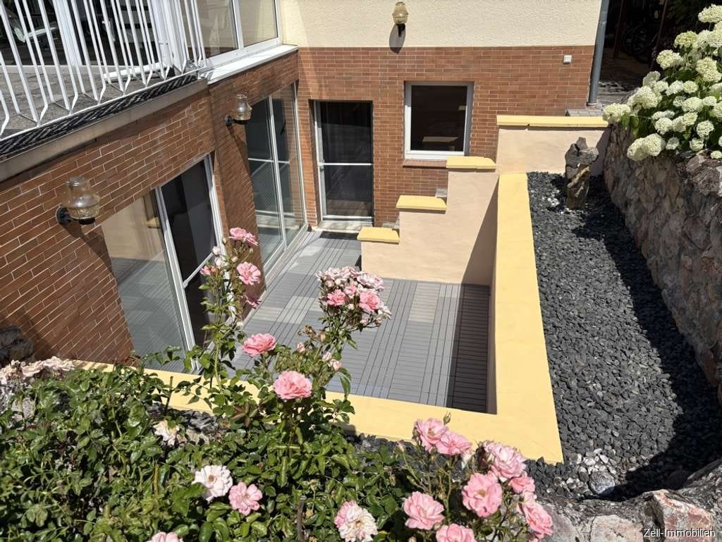Immobilie in Eltville am Rhein - Schöne Eigentumswohnung mit Terrasse und Stellplatz in guter Lage von Eltville - Bild 1
