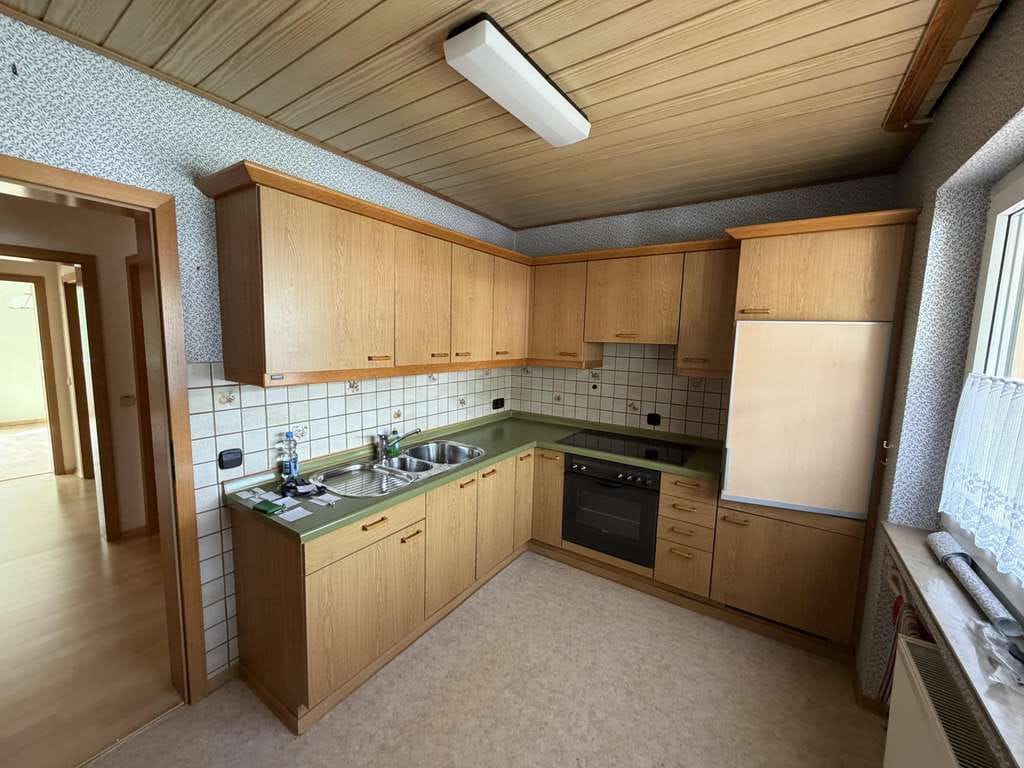 Immobilie in Neckartenzlingen - 2 Zimmer, Balkon, Stellplatz – alles da! - Bild 1
