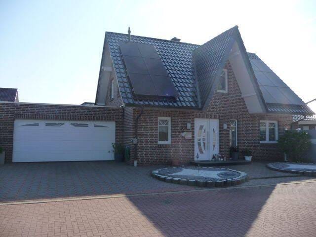 Immobilie in Badbergen - Gepflegtes Einfamilienhaus mit 1 Doppelgarage und 1 PV-Anlage in 49635 Badbergen - Bild 0