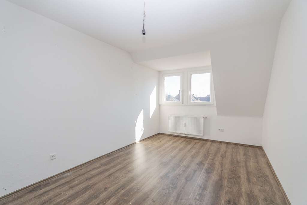 Immobilie in Korschenbroich - Charmante Maisonettewohnung mit modernem Wohnkomfort, Balkon und Garage in Glehn - Bild 3
