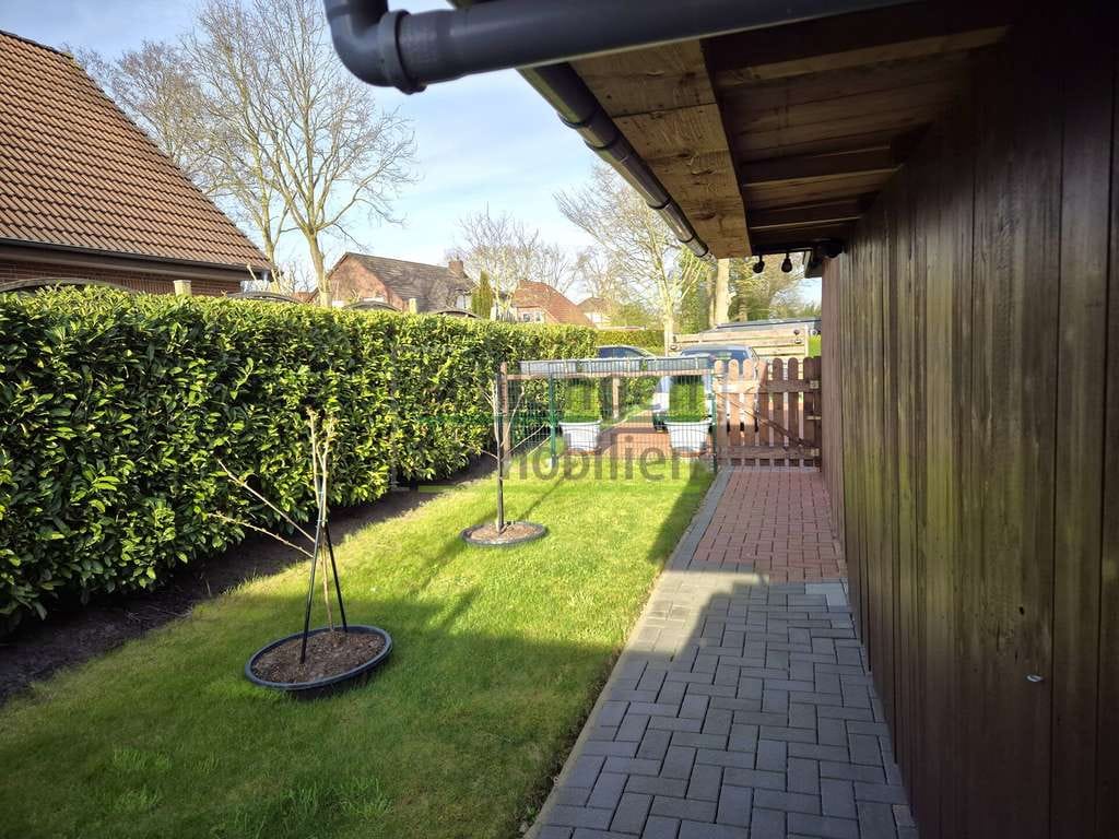Immobilie in Saterland - ZFH mit Garage, Carport und Garten in Saterland - Strücklingen - Bild 1