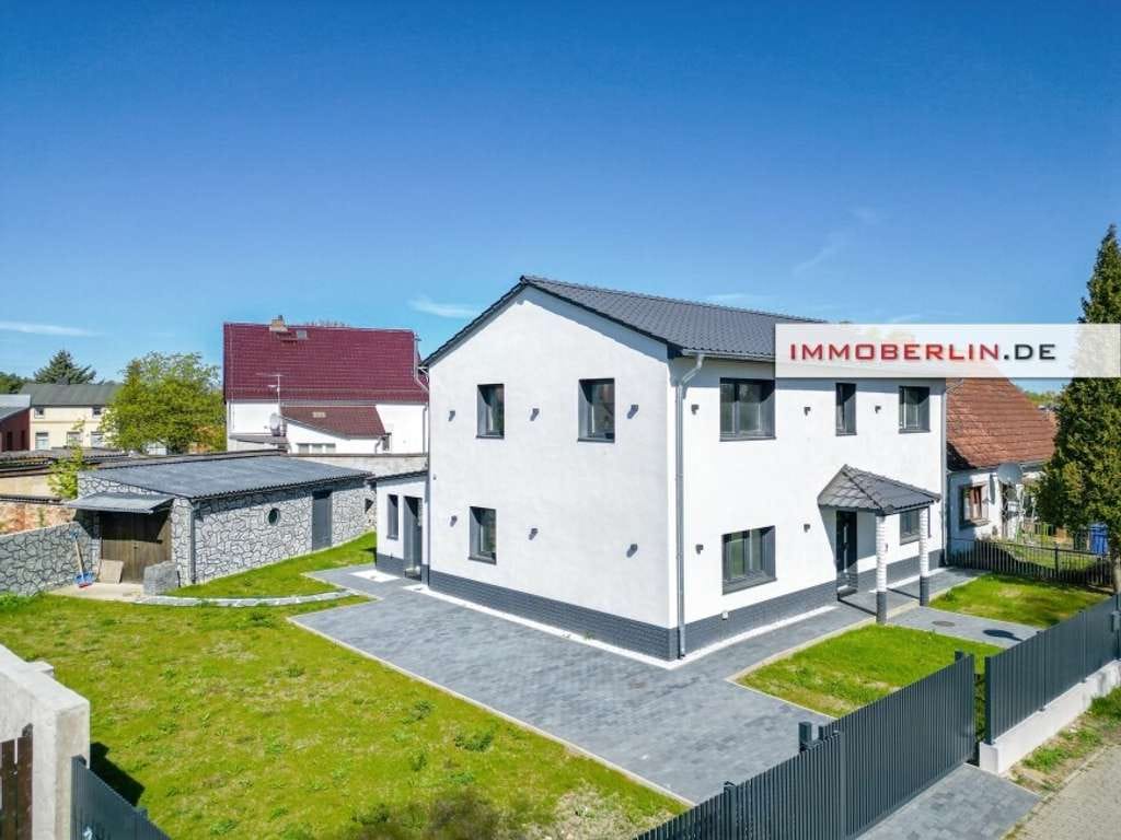 Immobilie in Schorfheide - IMMOBERLIN.DE - Für den Ersteinzug nach Sanierung! Attraktives Haus mit Südgarten & Garage - Bild 1