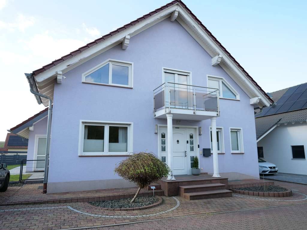 Immobilie in Wendelsheim - Lebensqualität pur - großzügiges Wohnen mit Design, Sauna & Naturblick - Bild 1