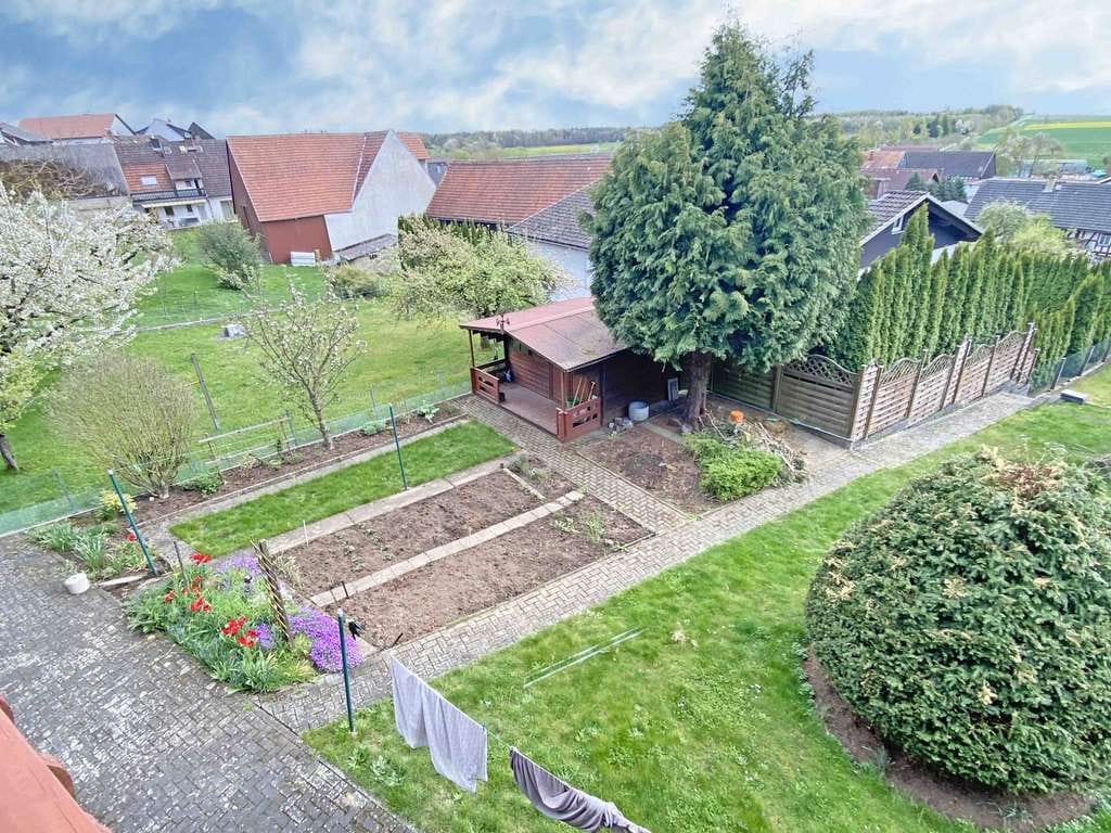 Immobilie in Mücke - Großzügiges Zweifamilienhaus mit Garten – ideal für Familien - Bild 3