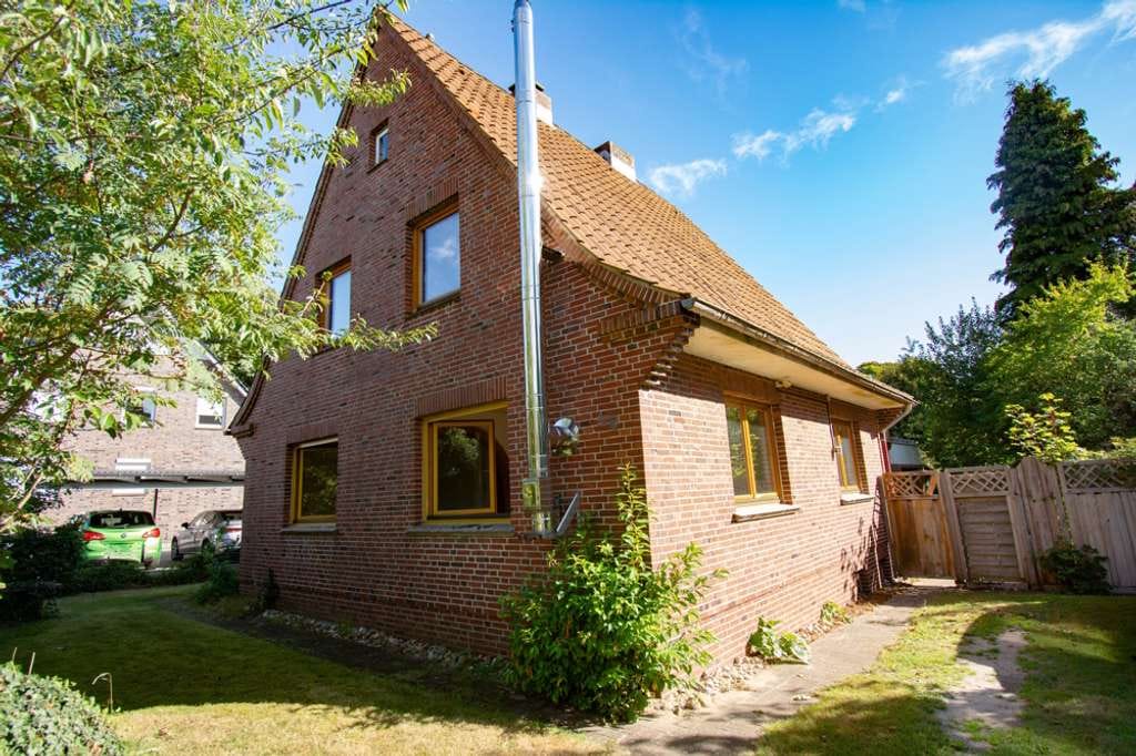 Immobilie in Buchholz - Familienfreundliches Haus mit Naturgarten, Dachterrasse und Entwicklungspotenzial - Bild 0