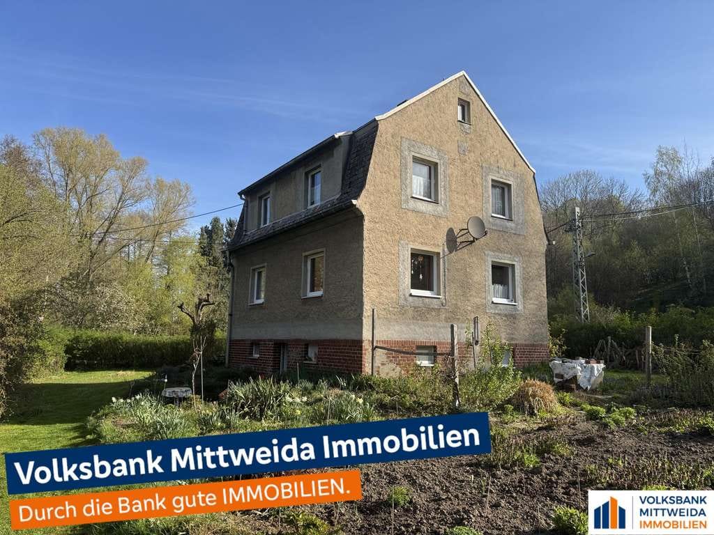 Immobilie in Hainichen - Einfamilienhaus mit großem Grundstück und Doppelgarage in ruhiger Lage!

 - Bild 0