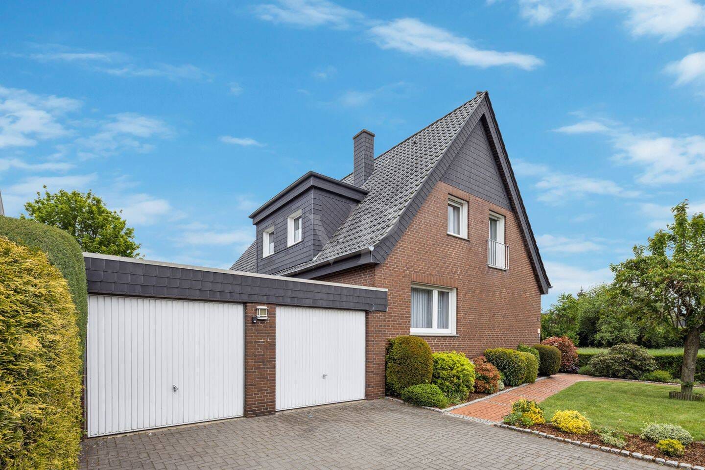 Immobilie in Ibbenbüren - Charmantes Einfamilienhaus mit vielseitigen Nutzungsmöglichkeiten – Ideal für Mehrgenerationenwohnen - Bild 1