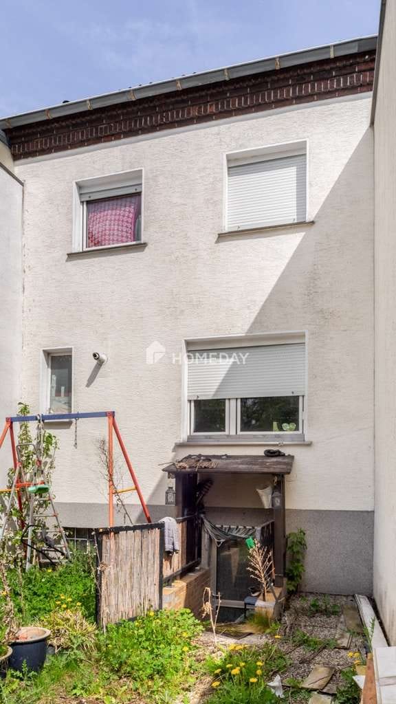 Immobilie in Ahlen - Wohnen mit Herz: Reihenhaus mit Kamin & sonniger Terrasse - Bild 2