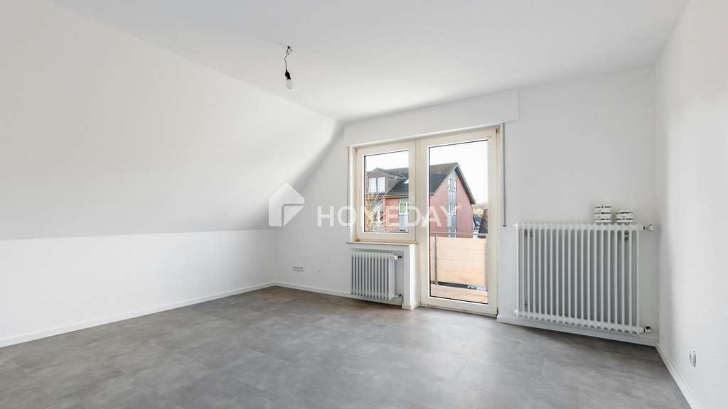Immobilie in Wallenhorst - Solides Mehrfamilienhaus mit sechs Wohneinheiten, Garten und stabiler Vermietung - Bild 3