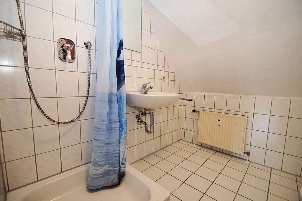 Immobilie in Neuffen - Zentrumsnah wohnen mit Tiefgarage und kurzen Wegen - Bild 3