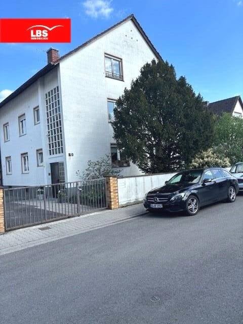 Immobilie in Pfungstadt - Großes Dreifamilienhaus in ruhiger, zentraler Wohnlage im Süden von Pfungstadt - Bild 1