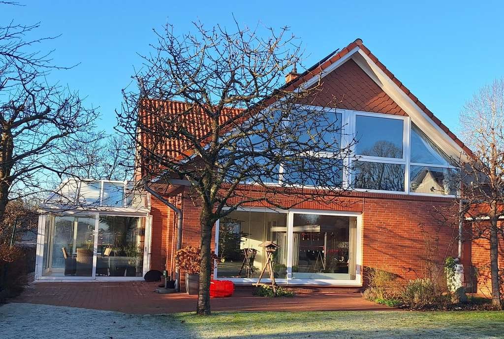 Immobilie in Hasloh - Voll unterkellertes Einfamilienhaus mit Wintergarten und Solar - Bild 1