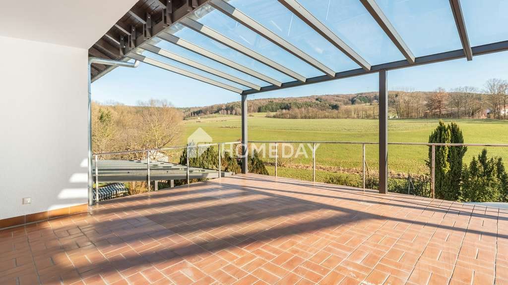 Immobilie in Kalbach - Modernisiertes Dreifamilienhaus mit 358 m², 16,5 kWp PV & traumhafter Süd-Terrasse mit Fernblick - Bild 1