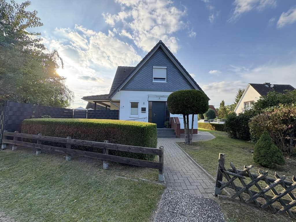 Immobilie in Lengenbostel - Volksbank Immobilien: Geräumiges Einfamilienhaus mit Terrasse, Garten & Bauplatz in Sittensen - Bild 1