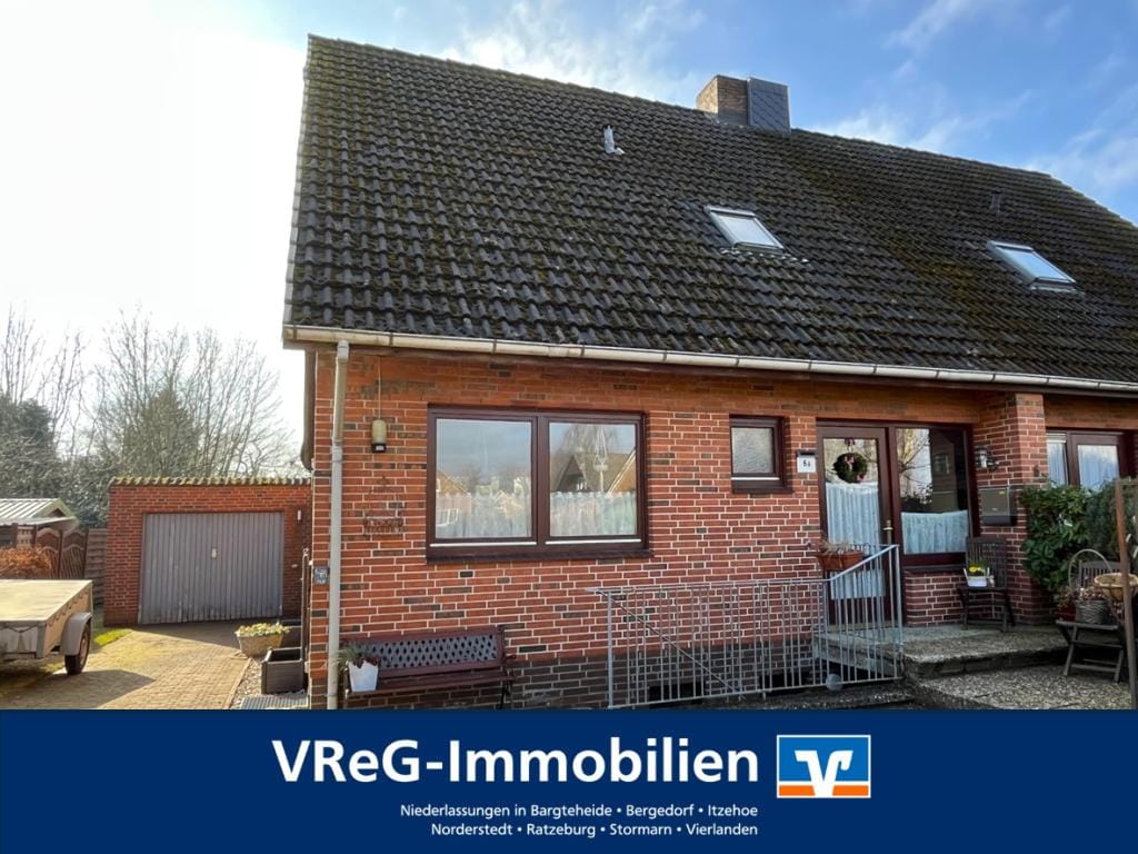 Immobilie in Drage - Familienfreundliches Zuhause mit Garage in idyllischer Dorflage - Bild 0