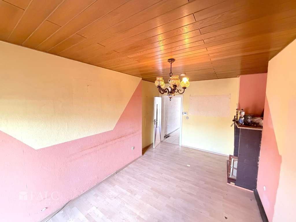 Immobilie in Dillingen/Saar - Charmantes Reihenmittelhaus mit Garten in zentraler Lage - Bild 1