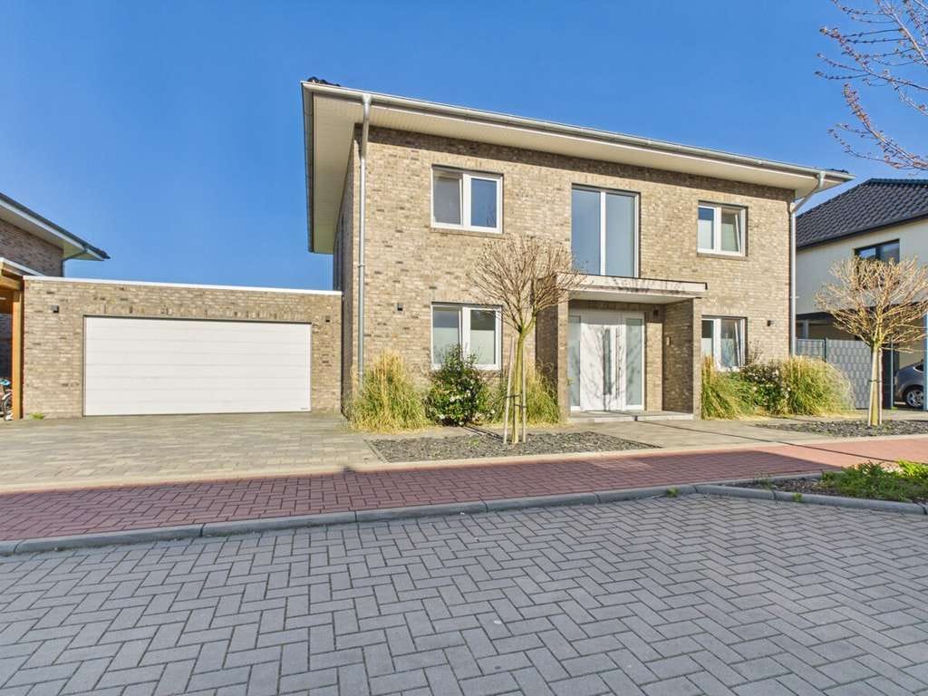 Immobilie in Ostercappeln - Modernes Einfamilienhaus in familienfreundlicher Lage mit Garten & Doppelgarage - Bild 0