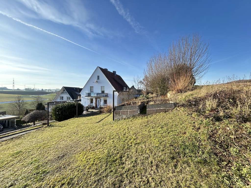 Immobilie in Marsberg - Zweifamilienhaus mit solider Substanz, Garten und Entwicklungspotenzial in Marsberg-Leitmar - Bild 4