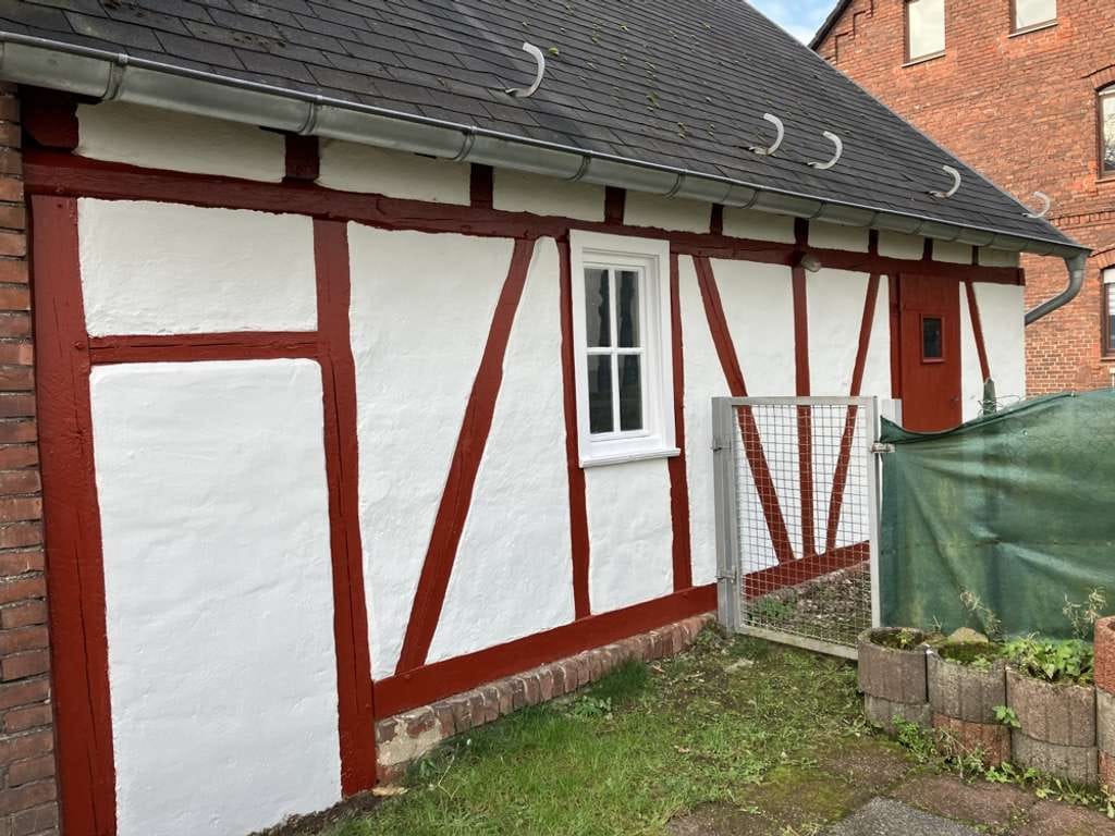 Immobilie in Nistertal - Westerwälder Geschichte mit Gesicht: Ihr neues Zuhause mit besonderer Fassade in 57647 Nistertal - Bild 2