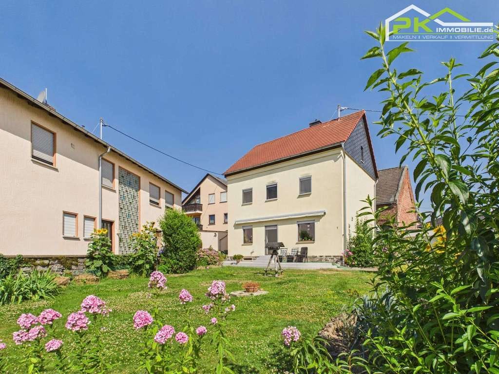 Immobilie in Nentershausen - Charmantes Einfamilienhaus mit Garten, Garage und Ausbaupotenzial - Bild 1