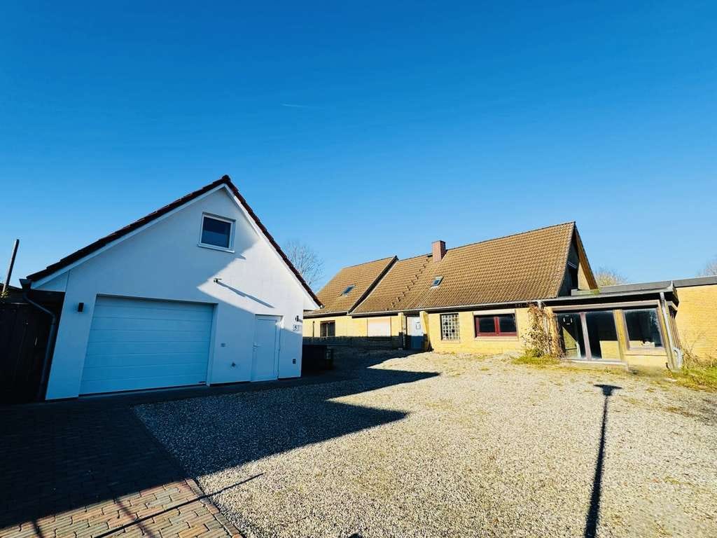 Immobilie in Winnemark - Projektchance in Schleinähe: Großzügiges Grundstück mit entkerntem Einfamilienhaus und neuer Garage - Bild 0