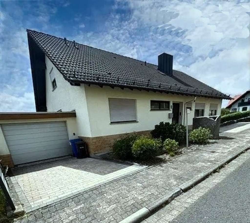 Immobilie in Rothenbuch - Großzügiges Einfamilienhaus mit Einliegerwohnung in sonniger, ruhiger Lage mit herrlicher Aussicht  - Bild 0