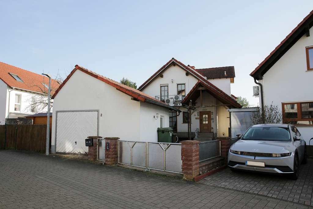 Immobilie in Germersheim - Einfamilienhaus inkl. Einliegerwohnung in begehrter Feldrandlage mit viel Potenzial! - Bild 1