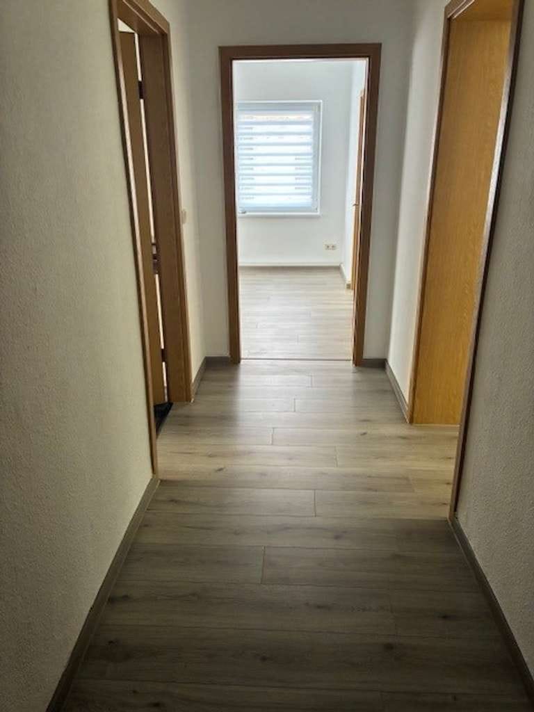 Immobilie in Rostock - solides Mehrfamilienhaus mit 8 WE, ca. 464 m² Grundstück und Garage - Bild 4