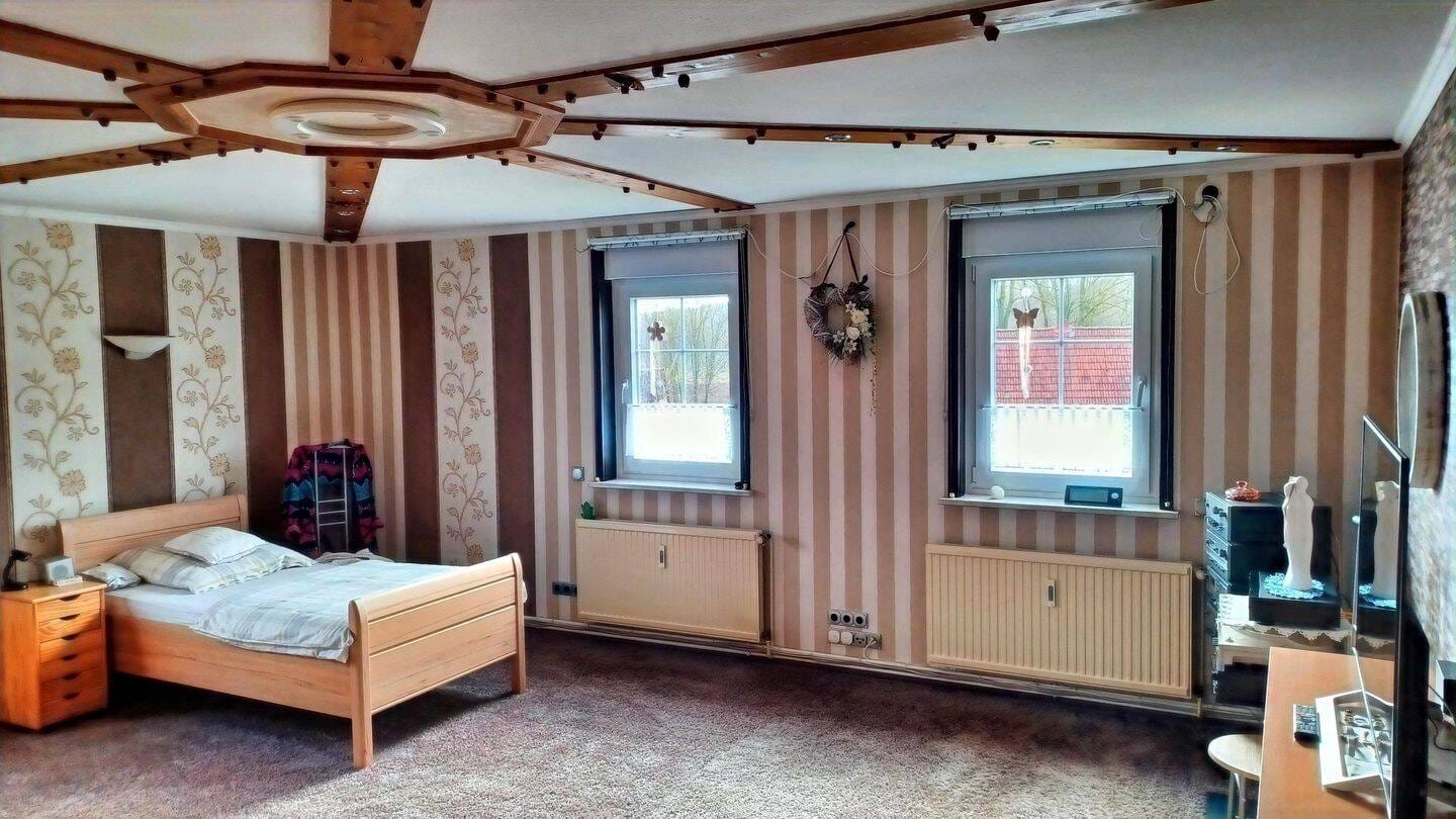 Immobilie in Herzberg am Harz - Charmantes Mehrfamilienhaus mit drei Garagen und Doppelcarport! - Bild 3